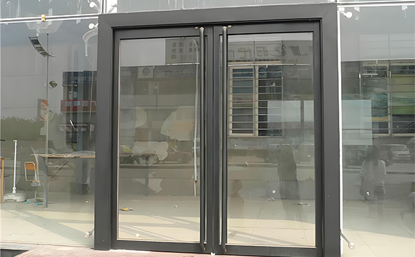 曲麻莱玻璃地弹门